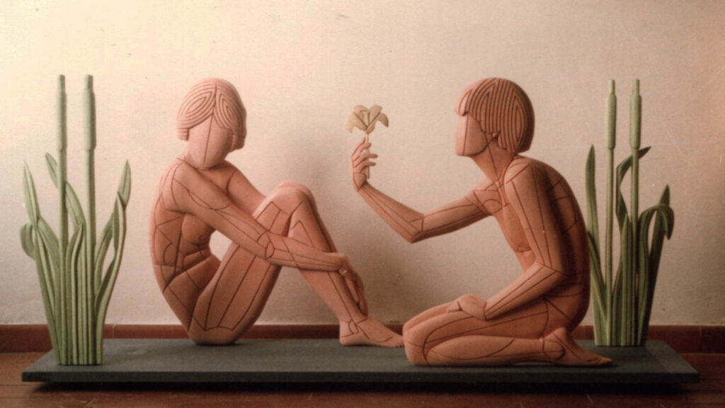 1983 uomo e donna, sculture lignee
