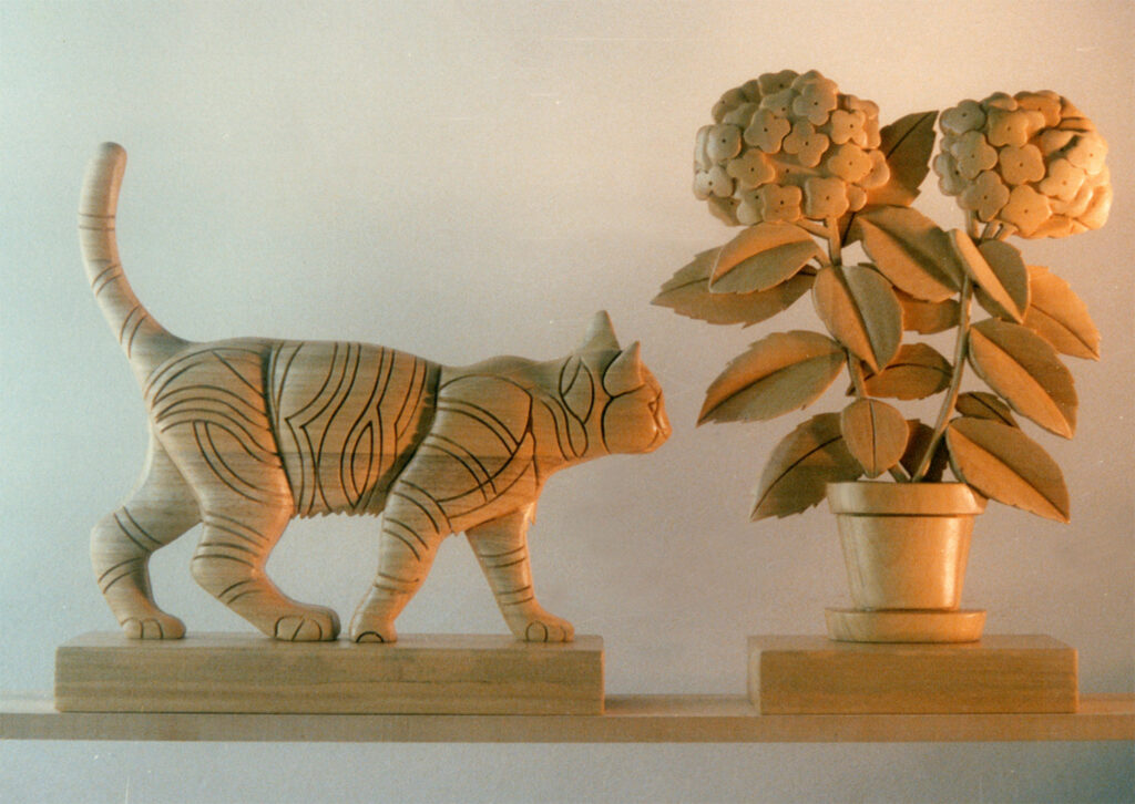 1985 gatto e vaso, sculture lignee
