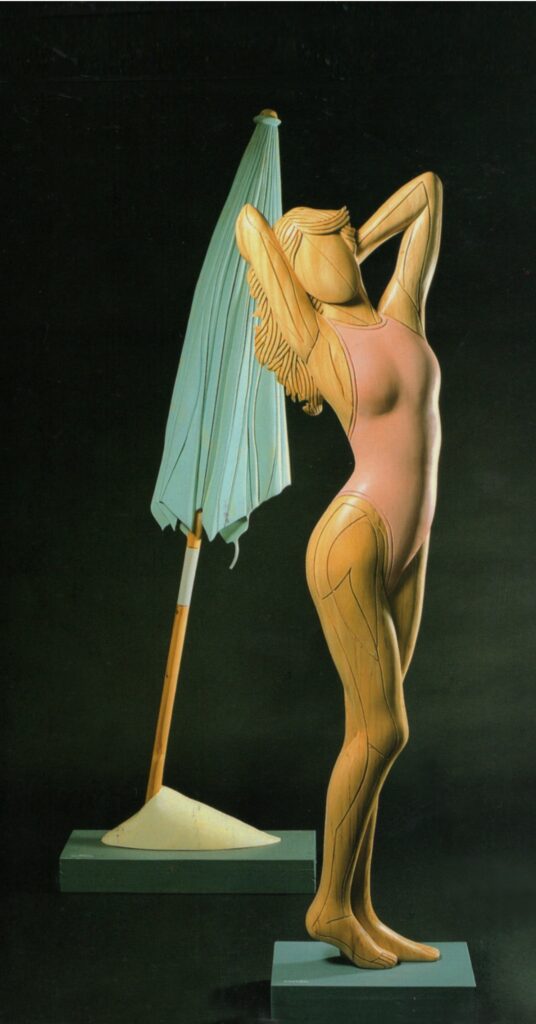 1989 donna e ombrellone, sculture lignee policrome